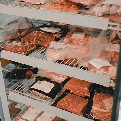 packaged meat in fridge